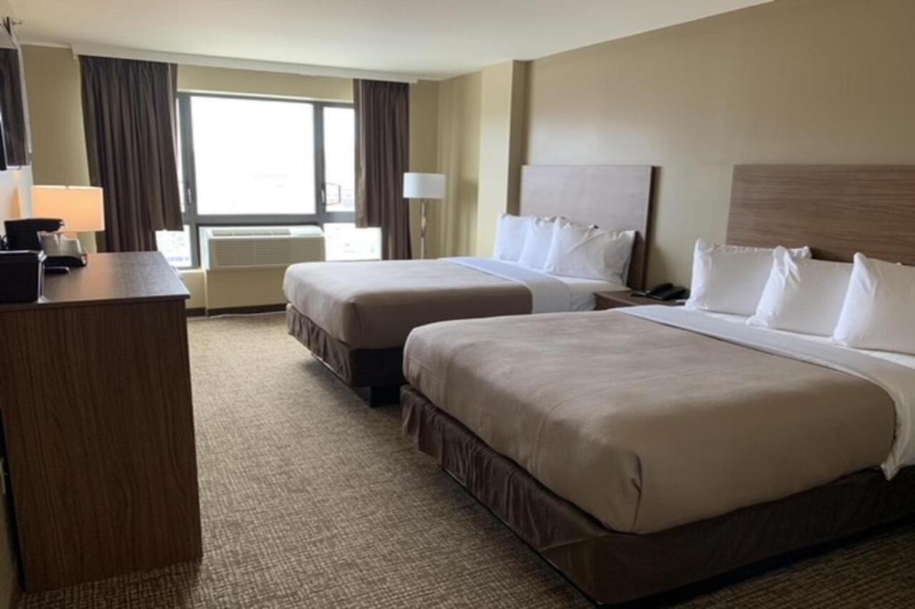 Astoria Delancy Inn & Suites New York Bagian luar foto