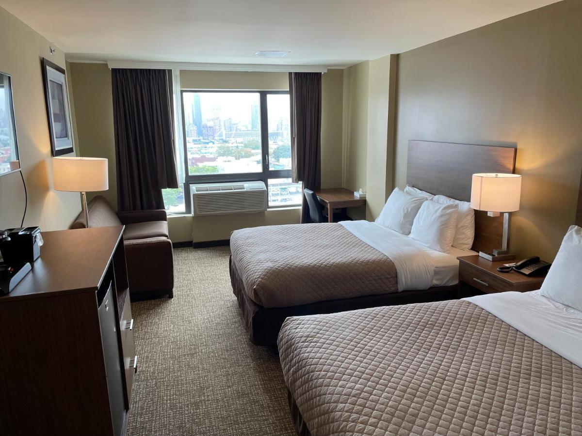 Astoria Delancy Inn & Suites New York Bagian luar foto